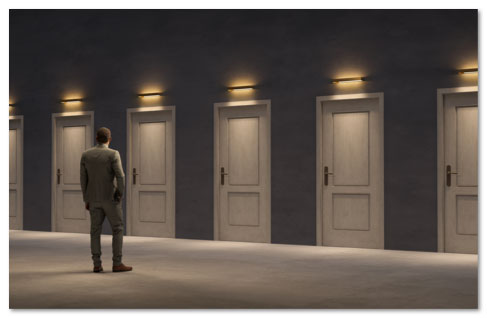Man in a suit looking at a row of 6 identical clsoed white doors